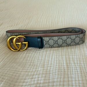 An authentic mens Gucci belt. A beautiful tan color with the classic Gucci logo